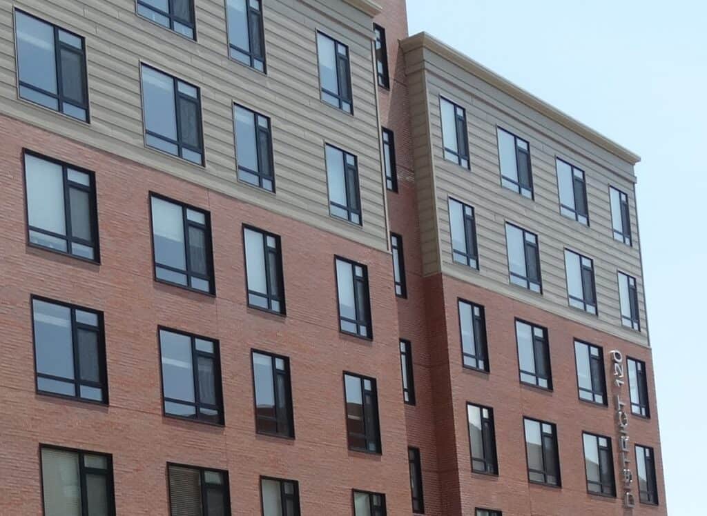 The brick cladding on the side of the Table Talk Lofts in Worcester, MA.